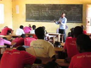 Powerful communicator Wilberforce Onyango, of northern Uganda, inspires the secondary students to acquire essential life skills, during an Oct. 2014 visit.